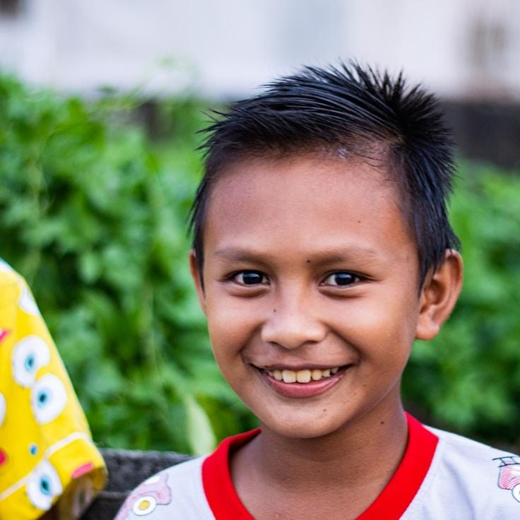 Nova Singh, Lead Design Curator at Bright Stream Platform, reviewing corporate floral arrangements